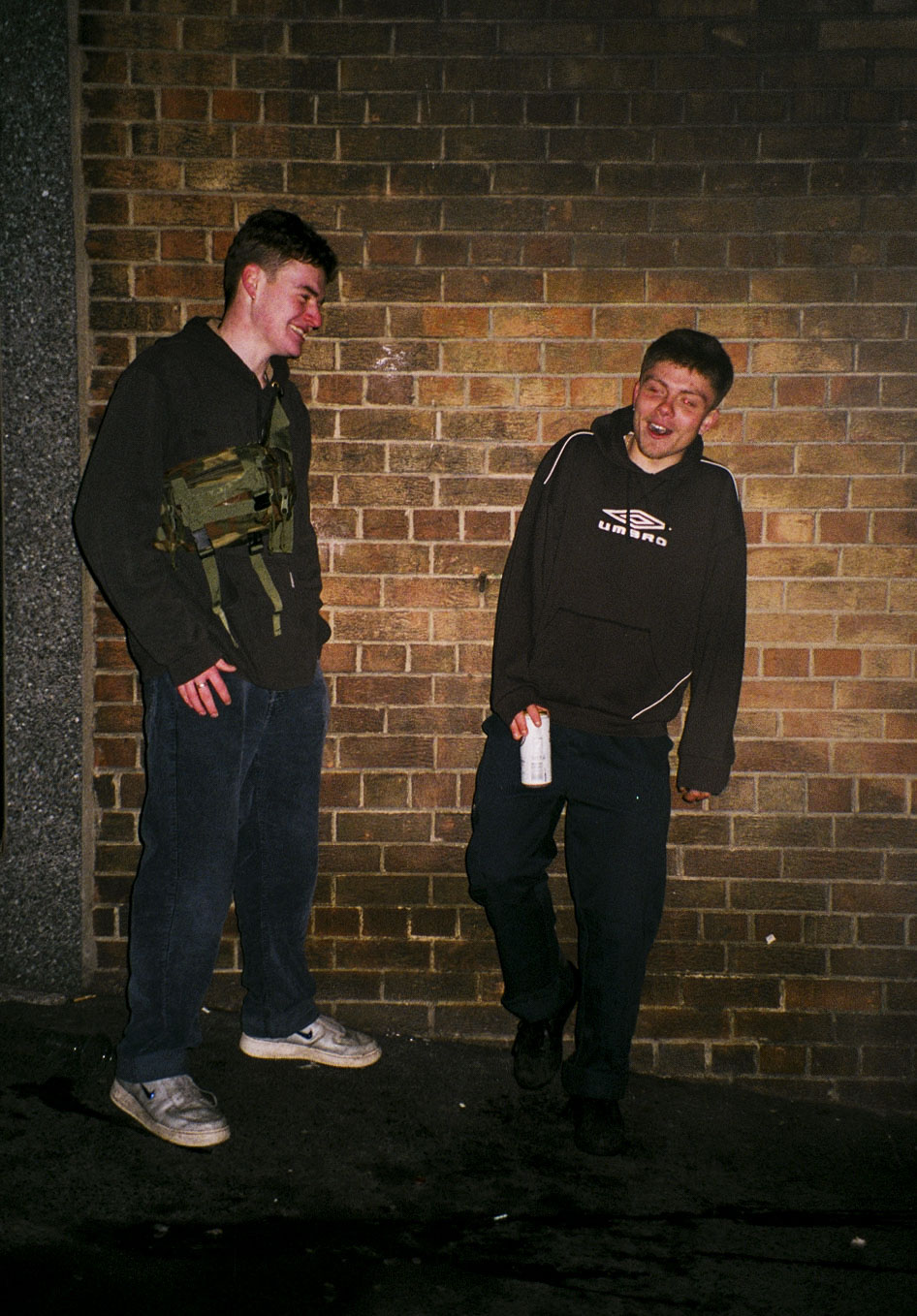 two boys drinking beer