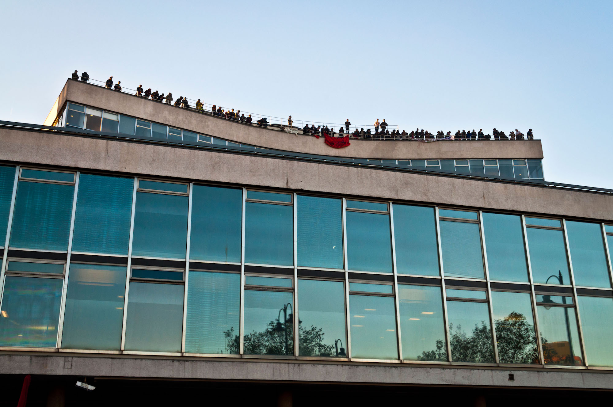 protesters on millbank roof