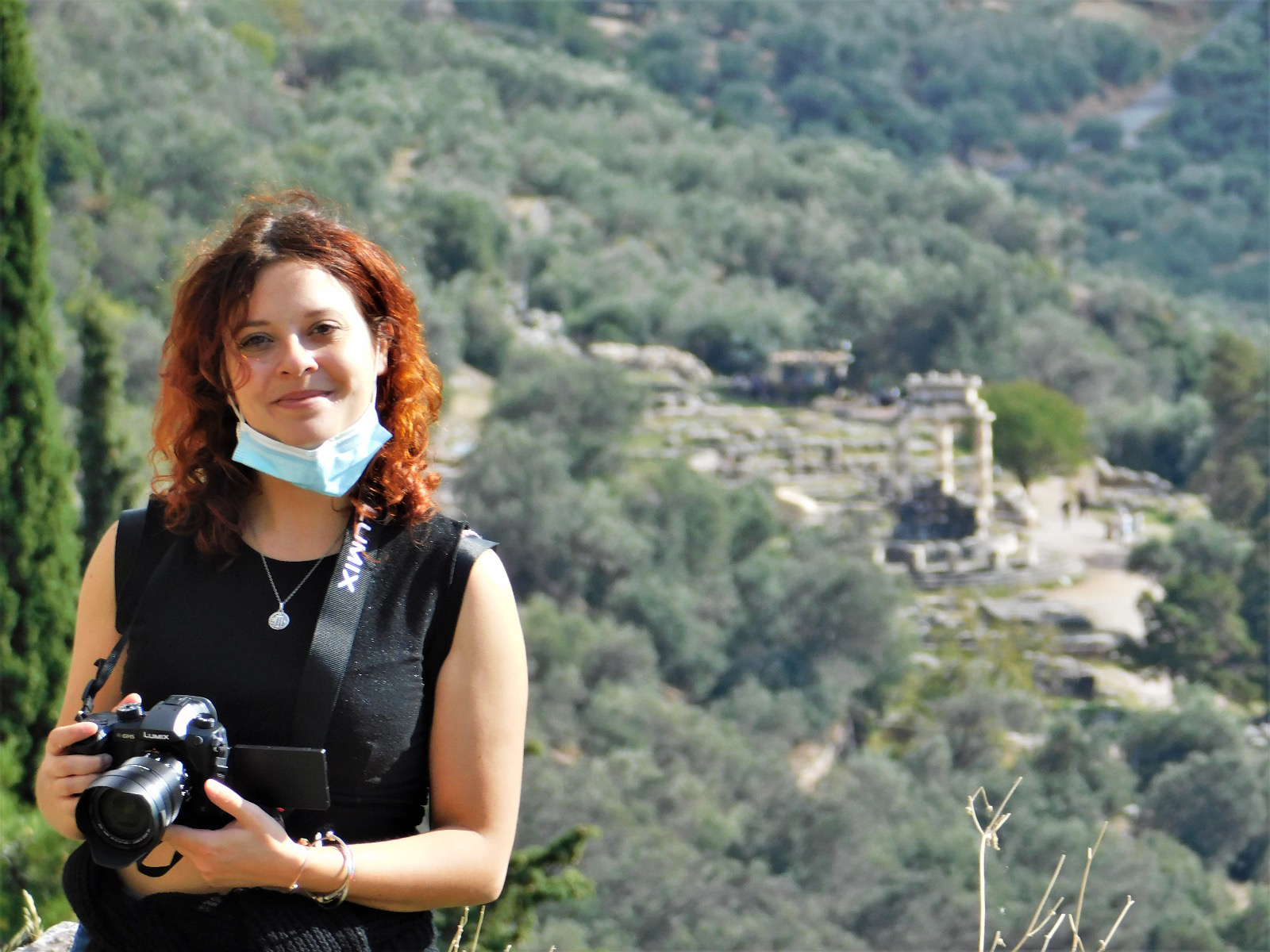 A photo of Sara with her camera.