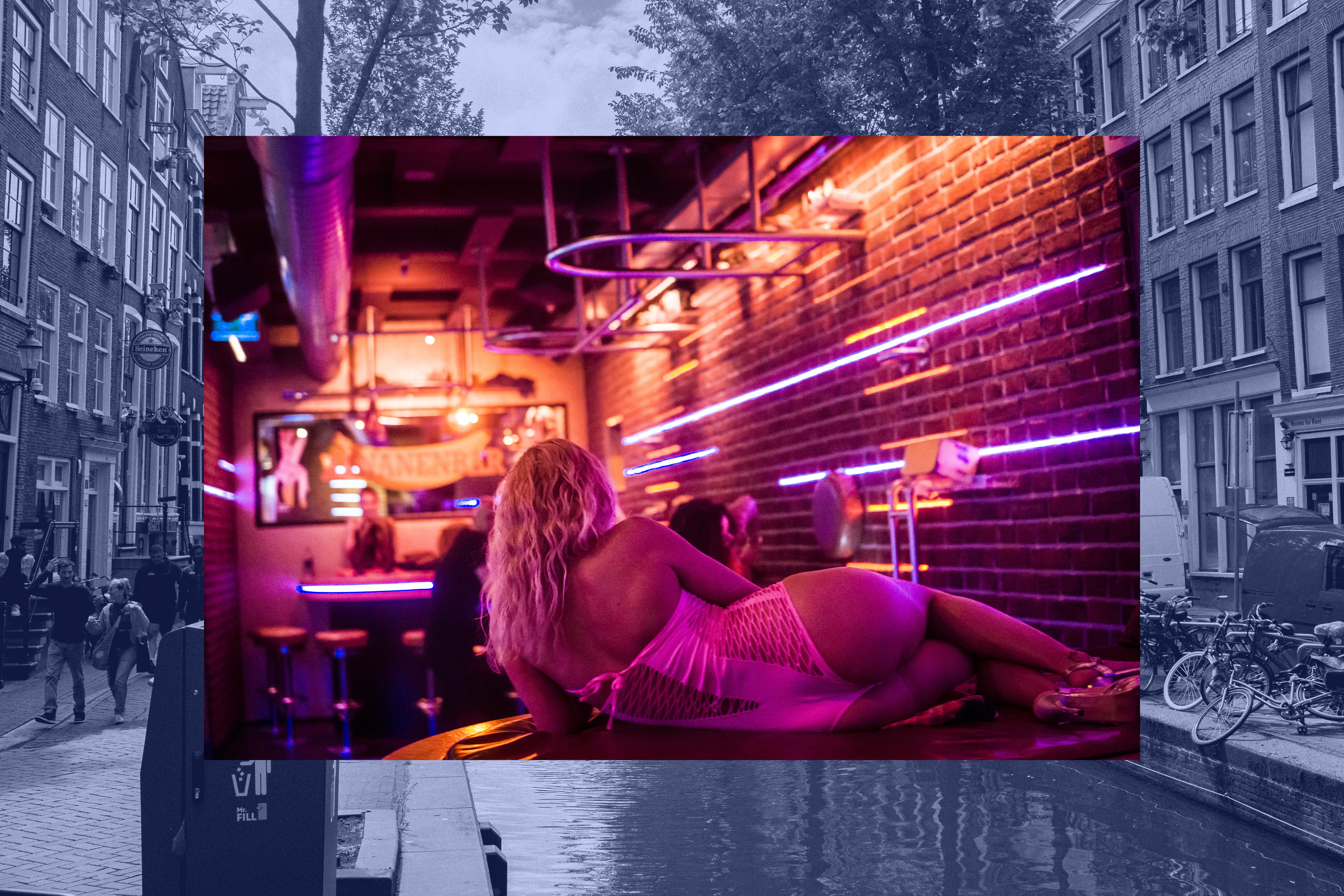 Sex worker pictured from behind, lying on a table in a bar.