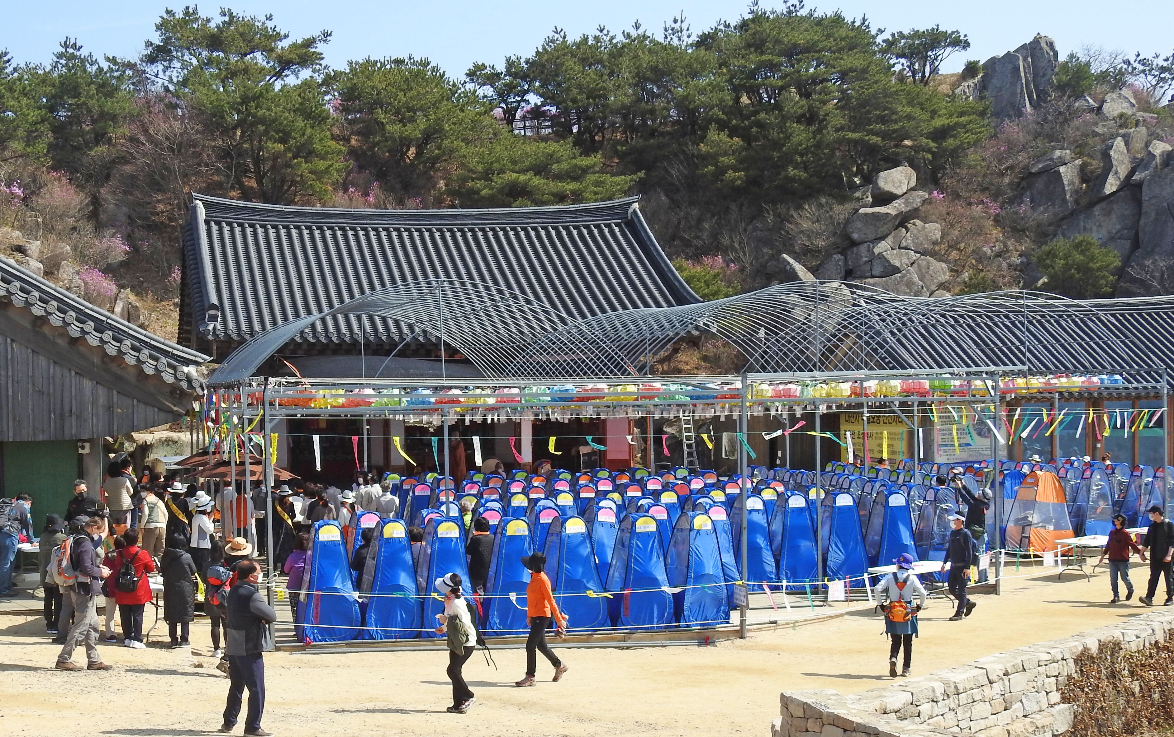 Prayer Pods Tent Buddhist temple South Korea COVID-19