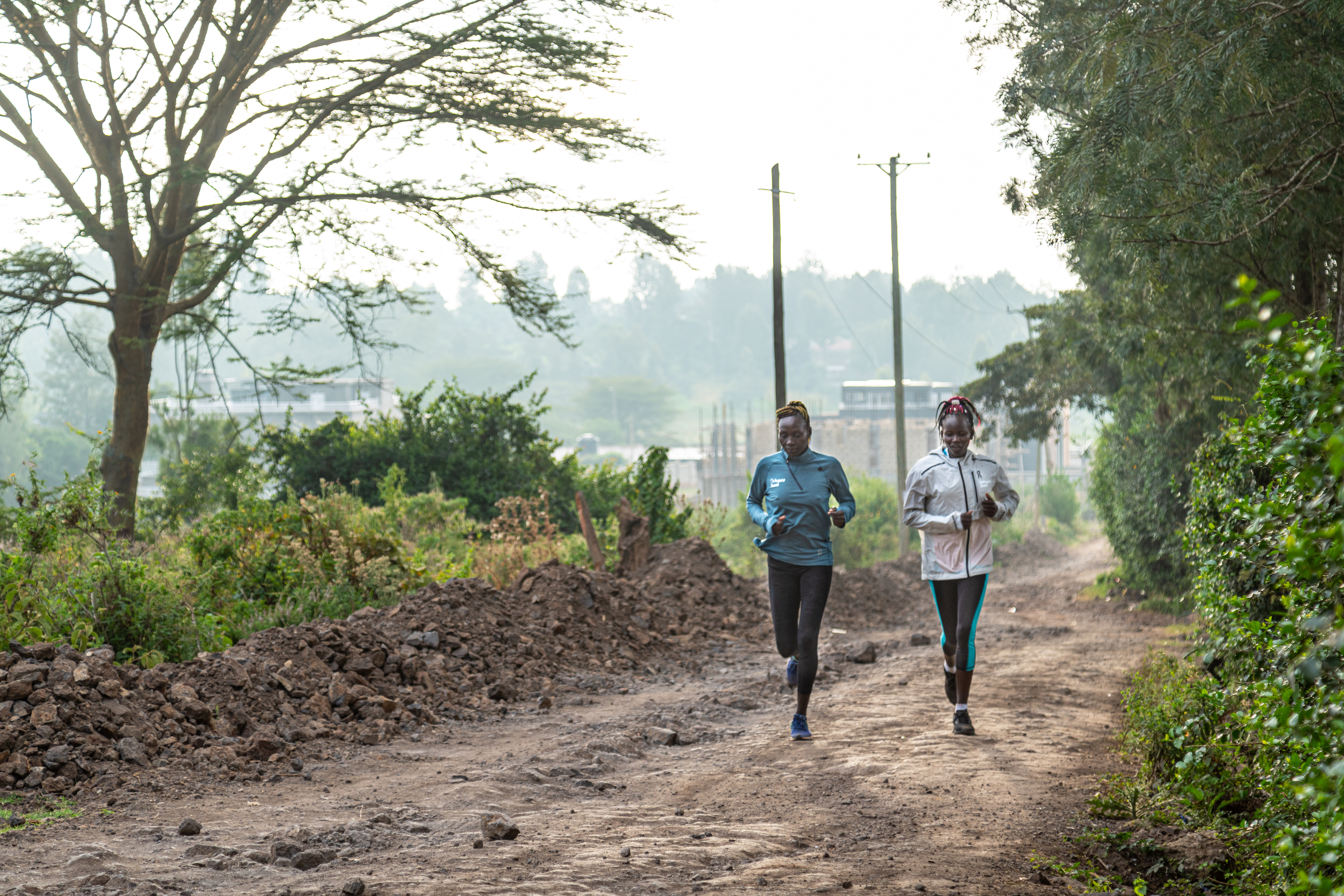 Anjelina Nadai Lohalith (left) and Natash Napule Gaspore finish their sunrise run into the Ngong forest.&nbsp;Photo: Leonardo Mangia