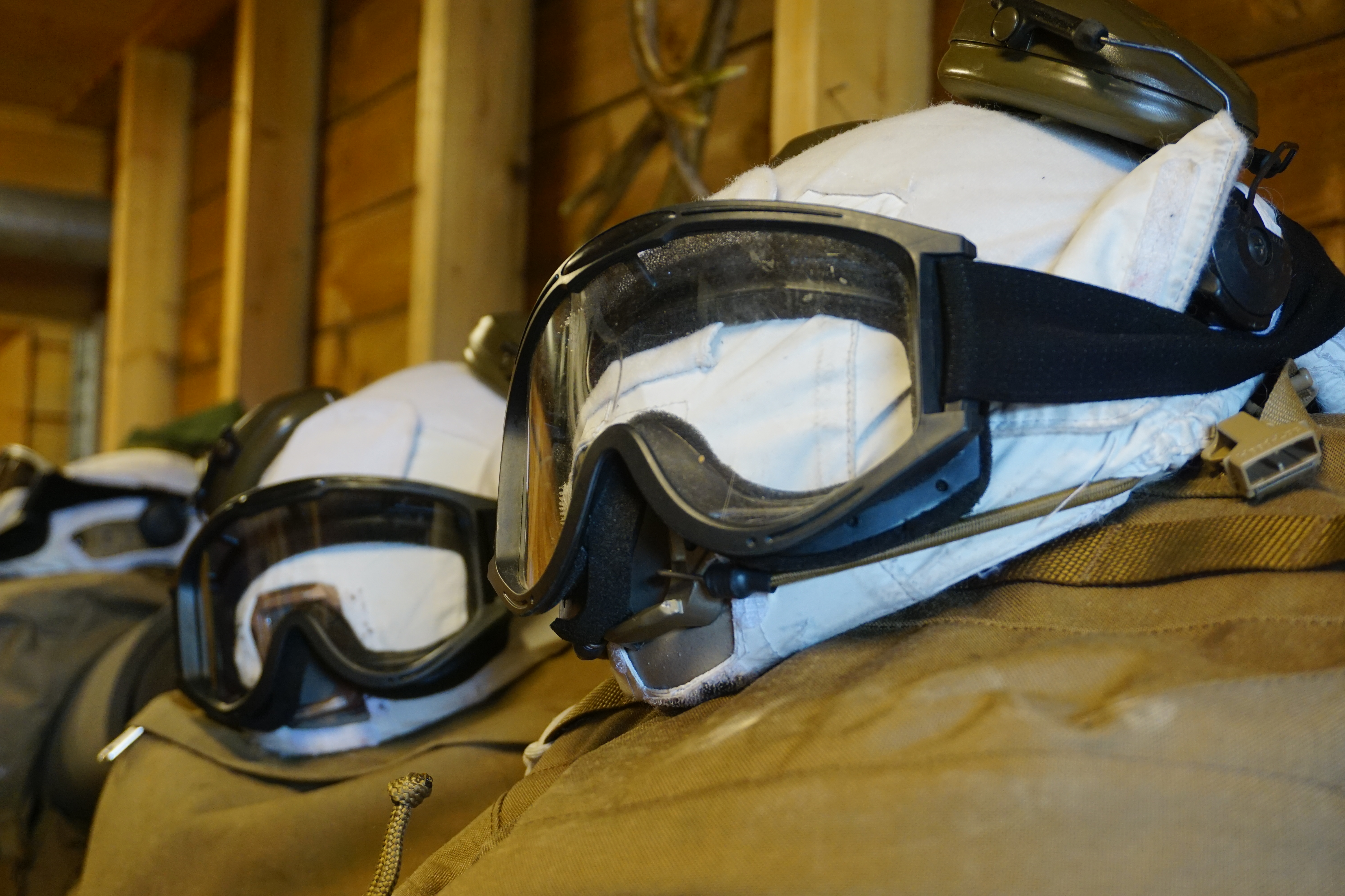 Winter helmets inside a Norwegian border post.