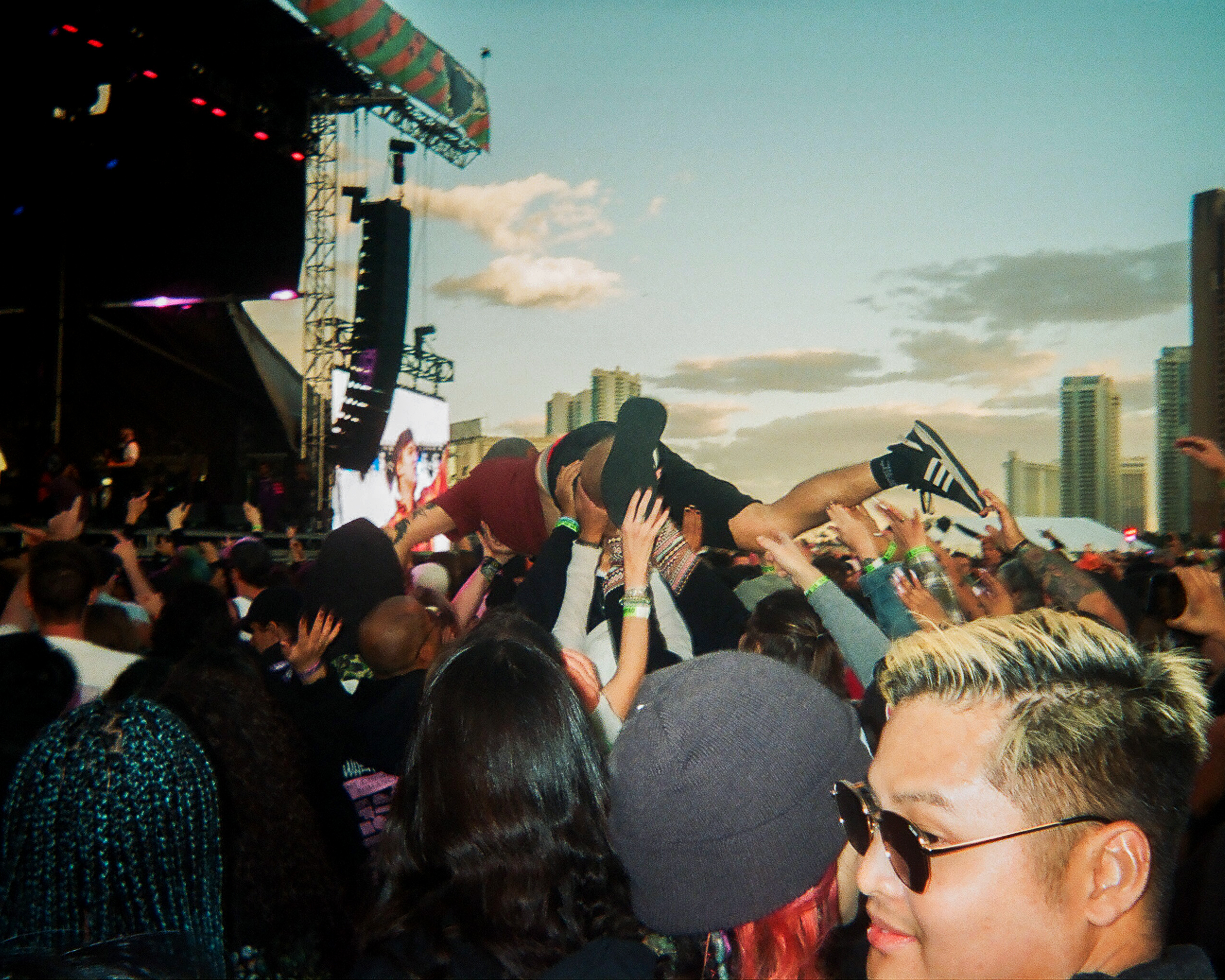 Man crowdsurfing at music festival