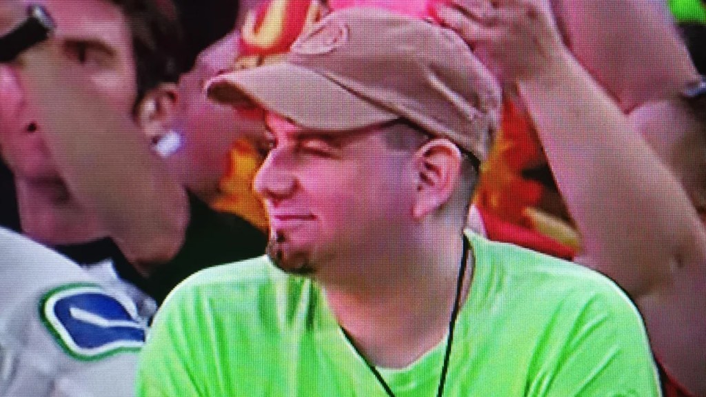The Mystery Behind WWE’s Green Shirt Guy Is Finally Solved